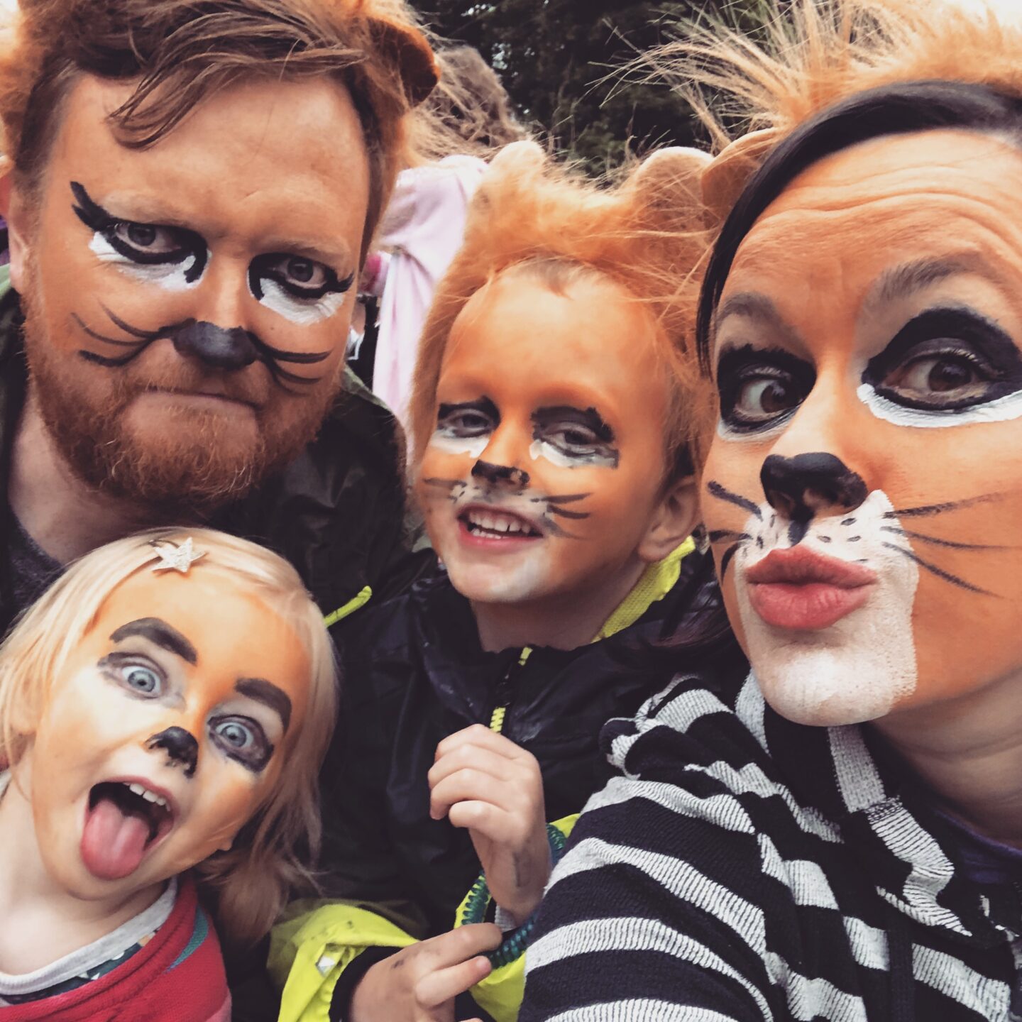 Just So Festival 2018 review and our top tips for Just So Festival - family with lion face paint 